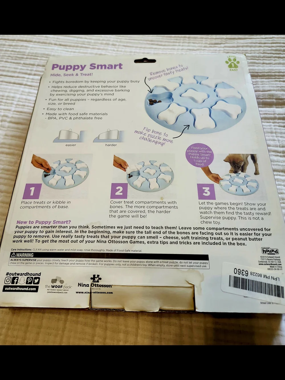 Nina Ottosson Level 1 Slow Feed Dog Puzzle Toy – Light Blue & Cream Treat